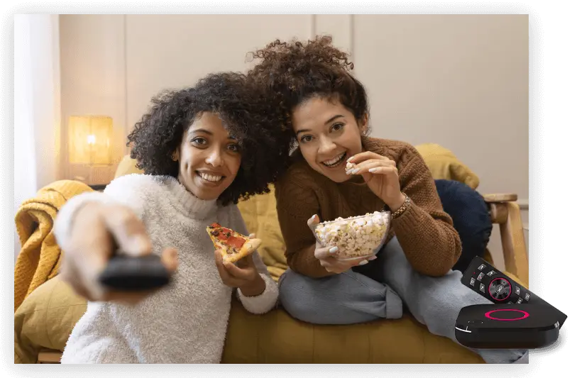 Friends relaxing together with a movie night at home